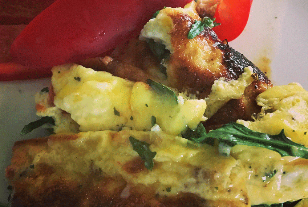 Eieromelette mit Tomaten, Mozzarella und Rucola